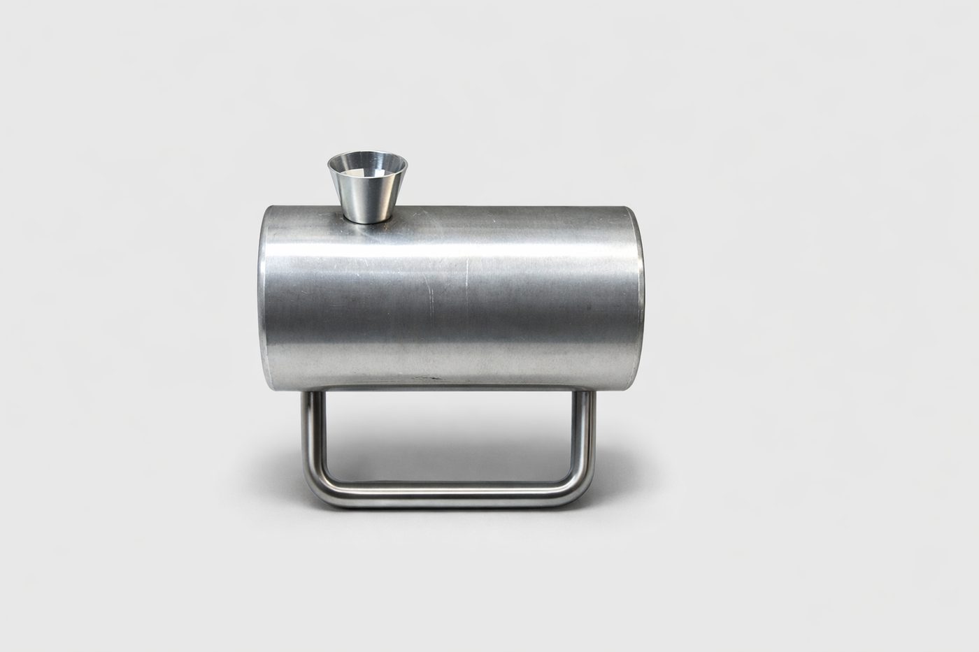 Polished straight handmade metal tobacco pipe with compact profile