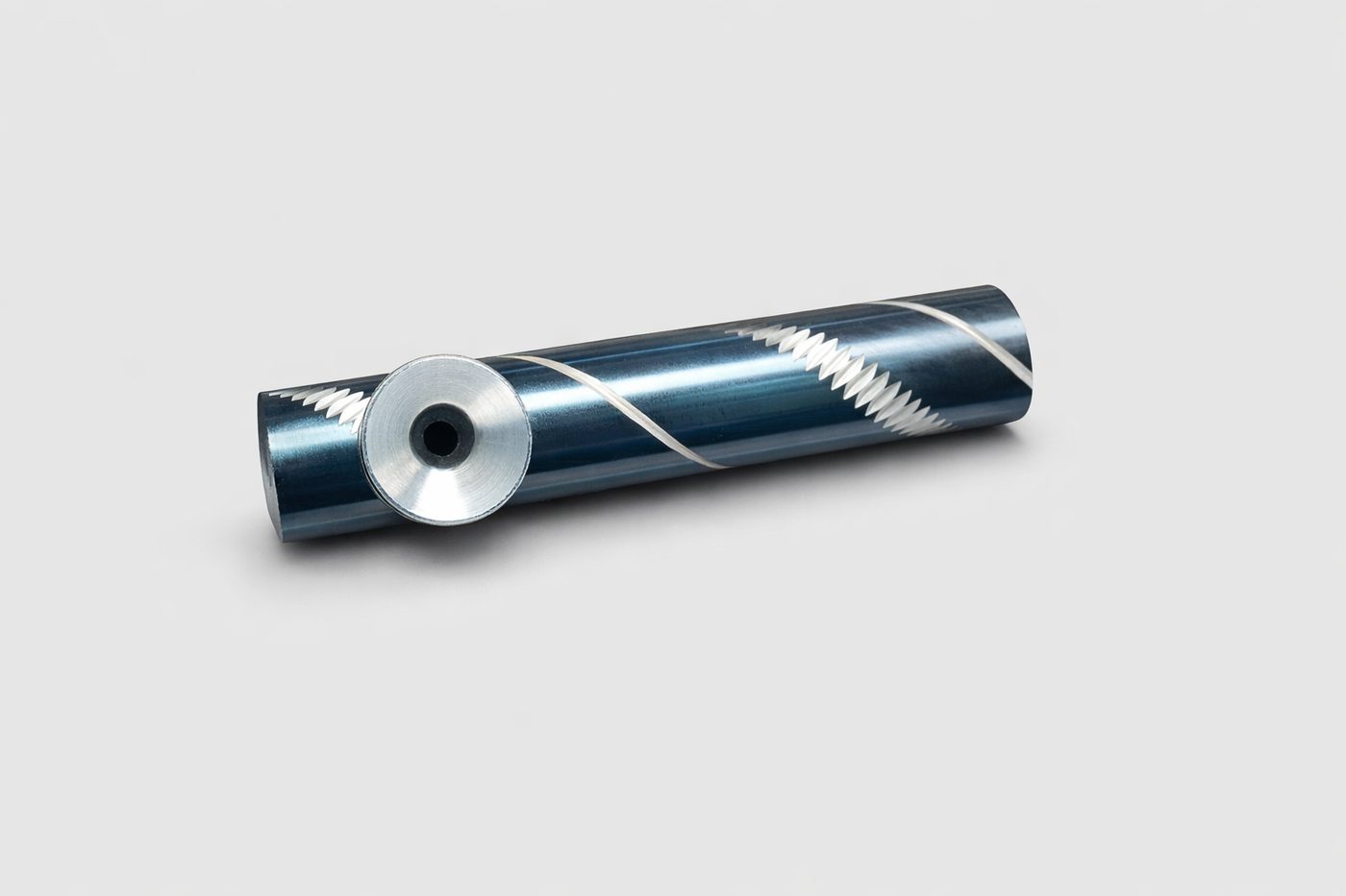 Spiral pattern metal tobacco pipe, angle view